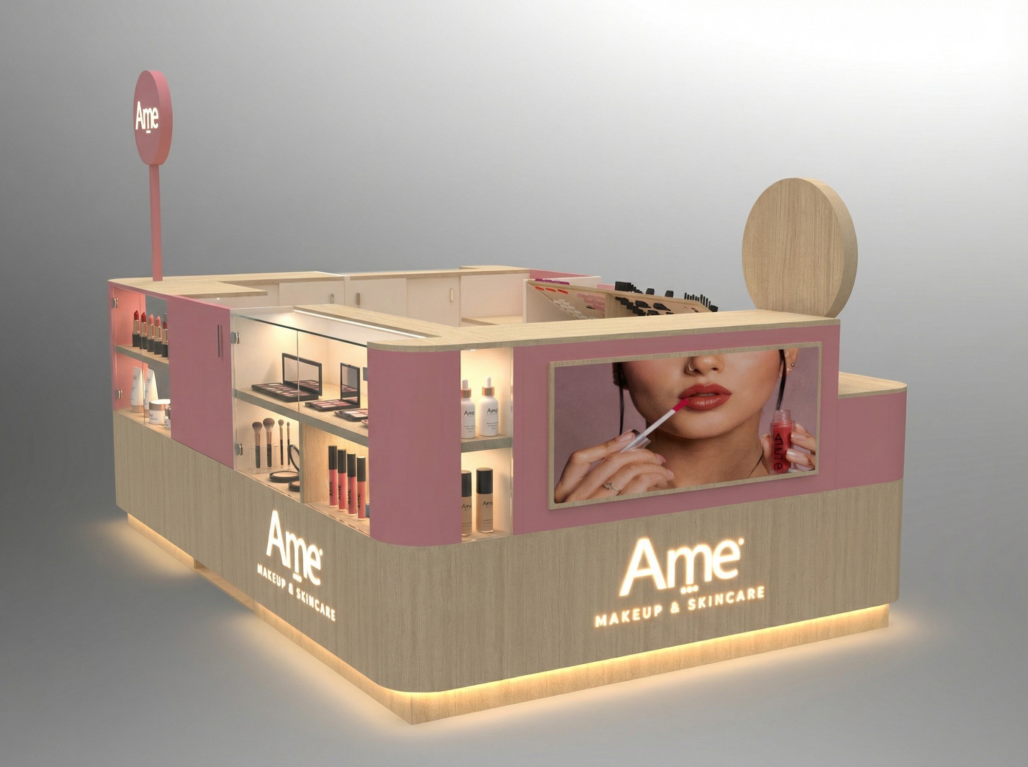 Costado de la isla con gráfica de marca, vitrinas iluminadas y logo Ame Makeup & Skincare